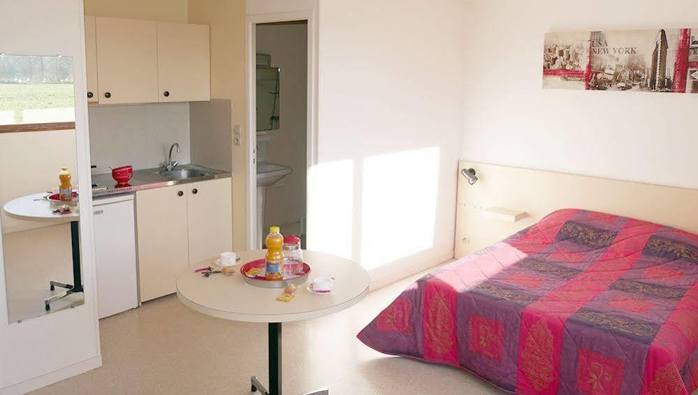 Residence Les Temporis Bretteville Sur Odon Bagian luar foto